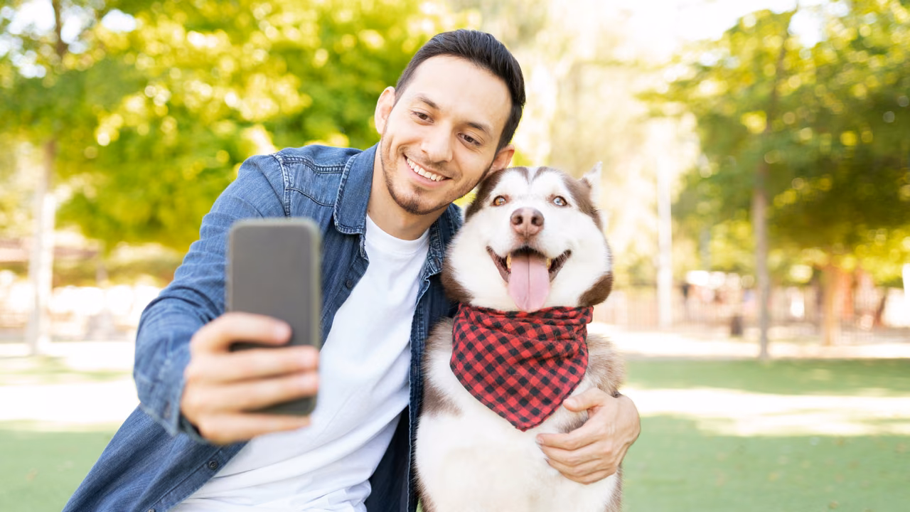 Man taking a selfie with his husky, ESA letter in Long Beach, CA
