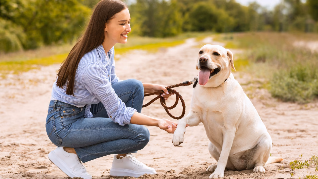Woman with her Labrador on a country path, ESA letter in Moreno Valley, CA