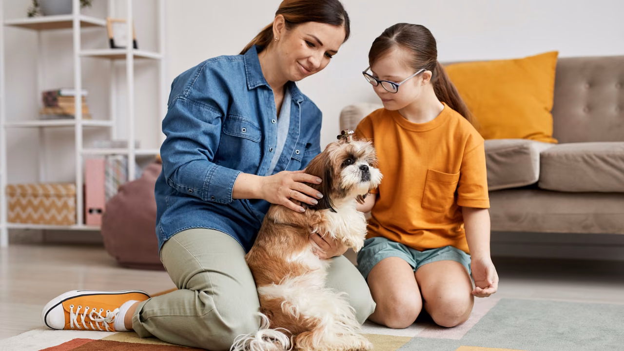 Mother and daughter petting their dog at home, ESA letter in Overland Park, KS